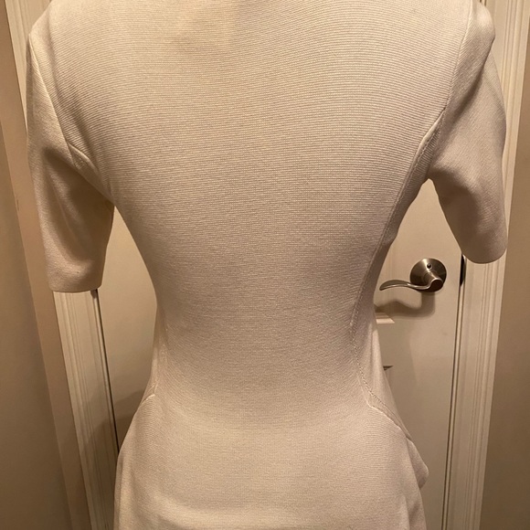 BCBGMAXAZRIA BCBG Cream peplum sweater top. SzM - Picture 6 of 8